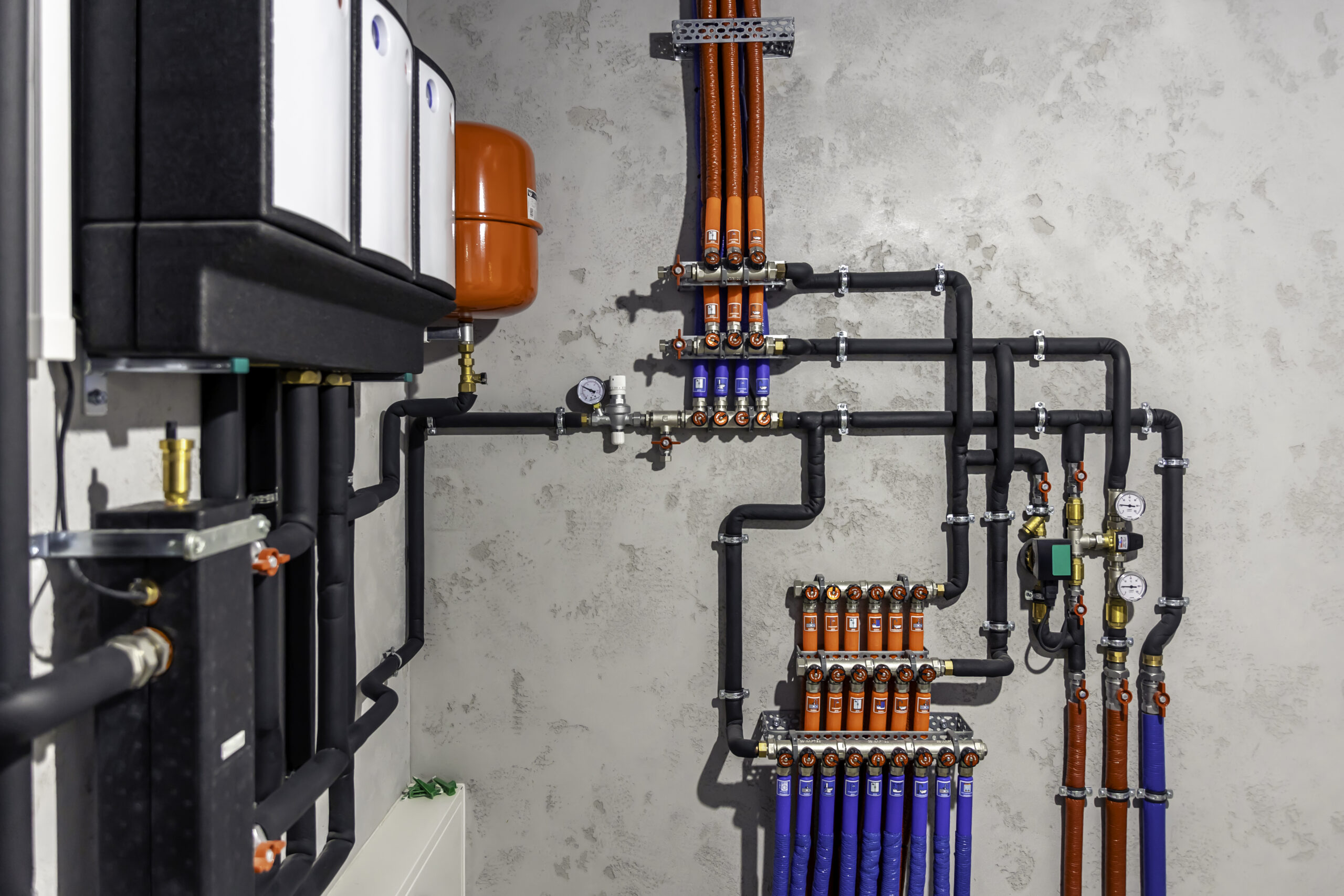 Modern autonomous heating system in the boiler room. A modern electric boiler room. Equipment for modern heating system as a boiler, heater,pipes, expansion tank and other.